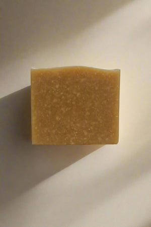 Bar of natural soap on a white background